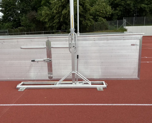 Stabhochsprungständer in Laufschienen, Sicherheitsabdeckung Stabhochsprungständer in Laufschienen, Sicherheitsabdeckung